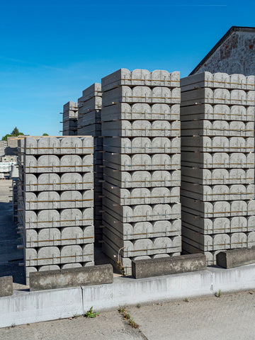 Stacks of concrete blocks at a construction site.